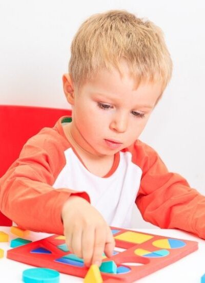 Boy learning shapes